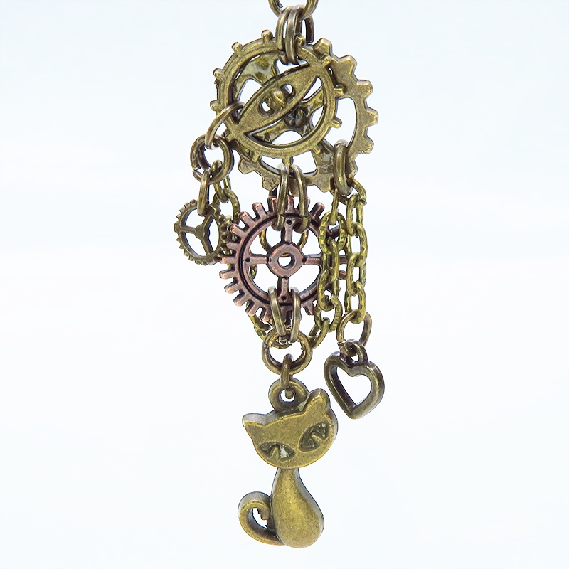 アンティークゴールド スチームパンク風 猫と歯車のアシンメトリーピアス チェーン ハート カギ 時計の針 コンパクト
