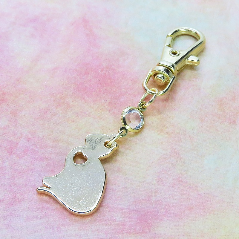 ゴールドカラー 猫シルエットモチーフとラインストーンのキーホルダー バッグチャーム シンプル クリア