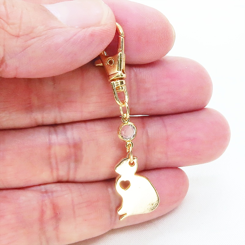ゴールドカラー 猫シルエットモチーフとラインストーンのキーホルダー バッグチャーム シンプル クリア