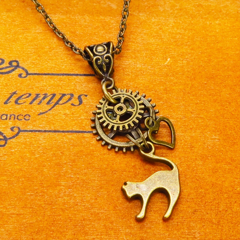 アンティークゴールド 跳ね猫と大小異なる歯車を組合せたスチームパンク風ネックレス コンパクト オープンハート