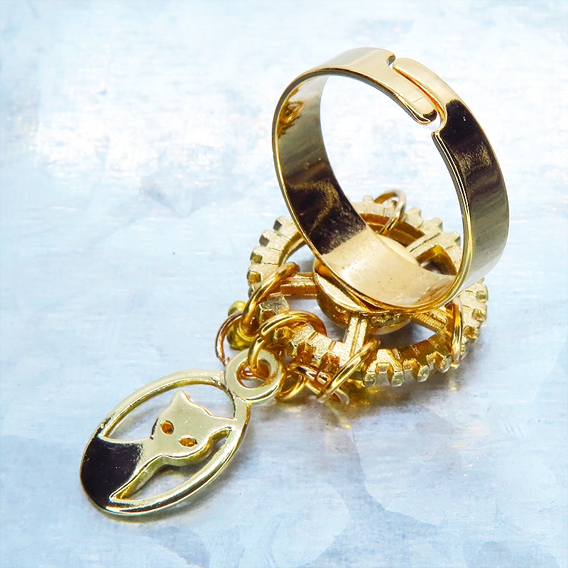 ゴールドカラー スチームパンク風猫と歯車のリング スワロフスキー チェーン フリーサイズ