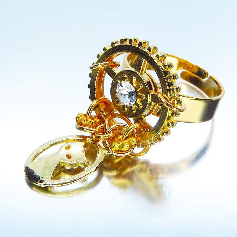 ゴールドカラー スチームパンク風猫と歯車のリング スワロフスキー チェーン フリーサイズ