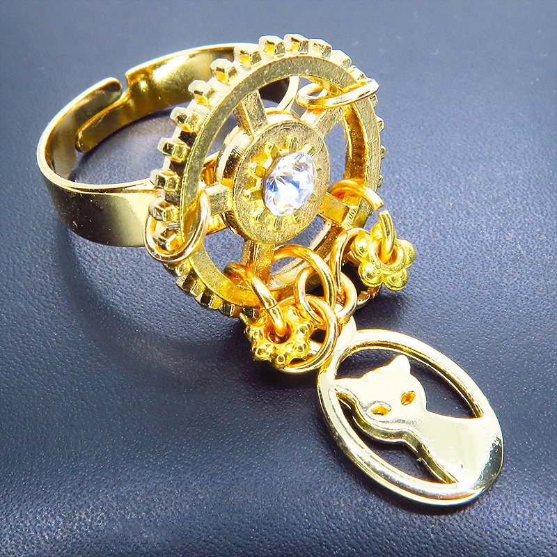 ゴールドカラー スチームパンク風猫と歯車のリング スワロフスキー チェーン フリーサイズ