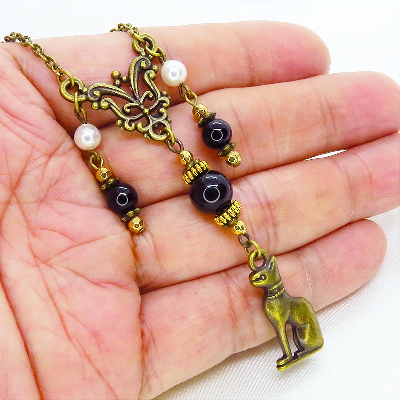 バステト 猫の女神 アンティークゴールド オリエンタル風オニキスとスワロフスキーパールを組合せたネックレス