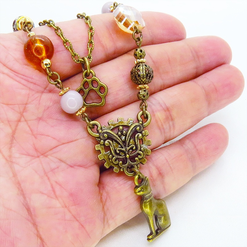 バステト 猫の神様 オリエンタル風 アンティークゴールド ダブルチェーン ビーズを組合わせたアシンメトリーネックレス