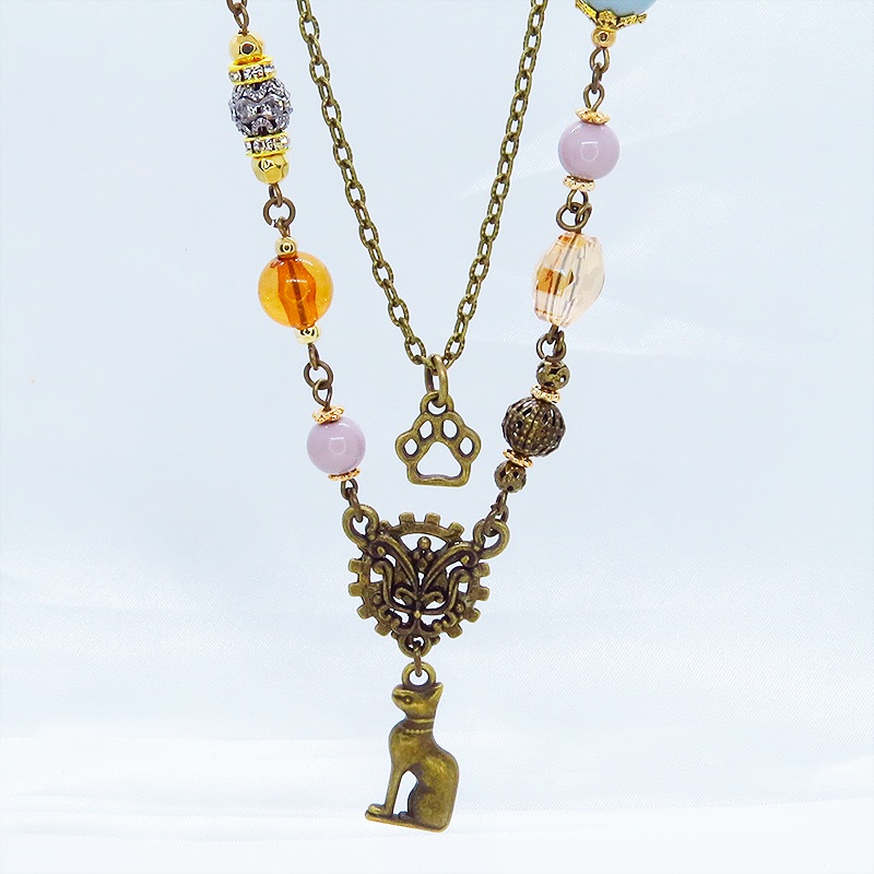 バステト 猫の神様 オリエンタル風 アンティークゴールド ダブルチェーン ビーズを組合わせたアシンメトリーネックレス