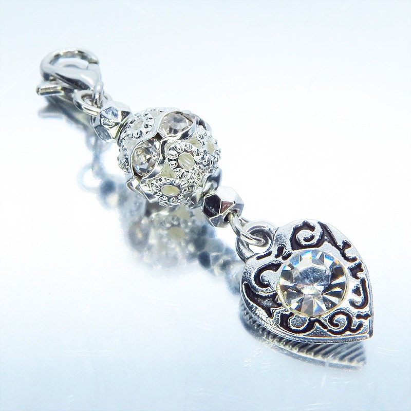 マスクチャーム シルバーカラー アラベスク調のラインストーンとメタルビーズを組み合わせたチャーム