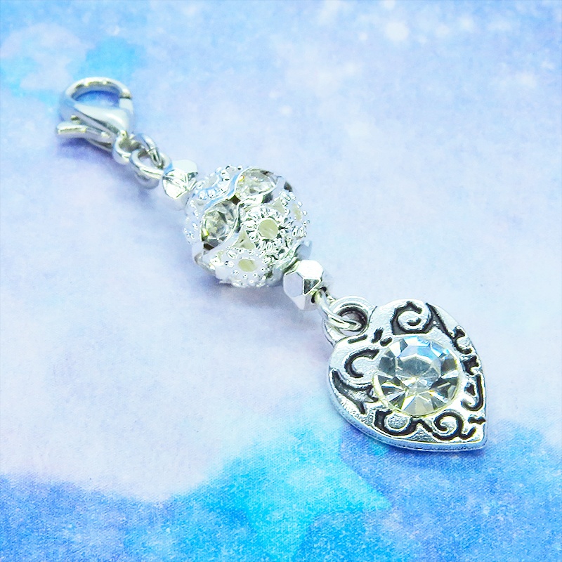 マスクチャーム シルバーカラー アラベスク調のラインストーンとメタルビーズを組み合わせたチャーム