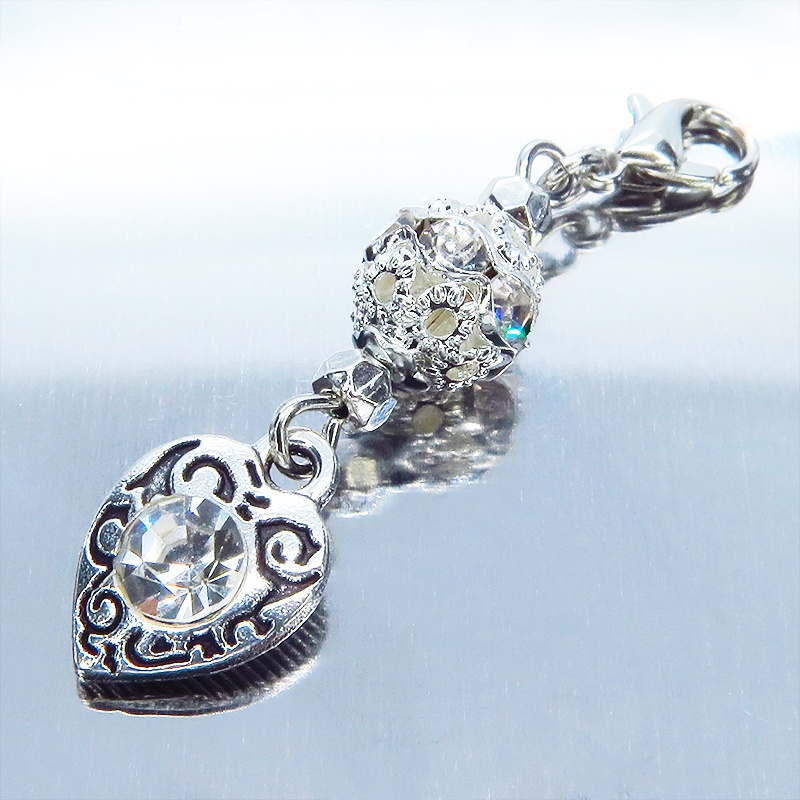 マスクチャーム シルバーカラー アラベスク調のラインストーンとメタルビーズを組み合わせたチャーム