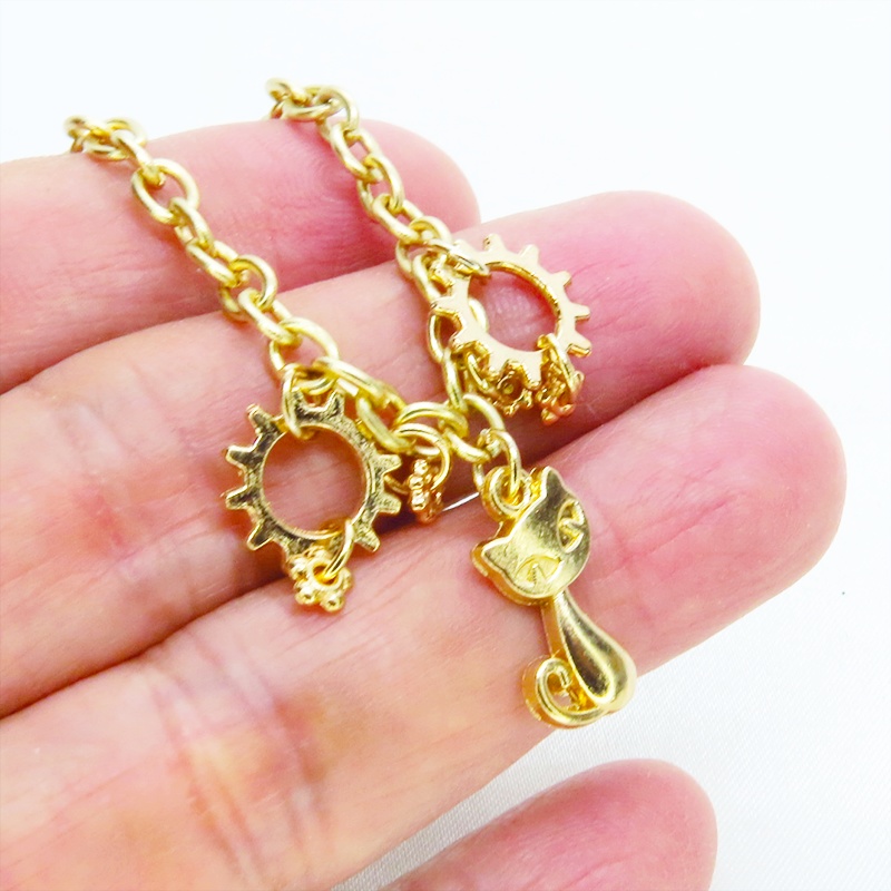 マットゴールド 猫と歯車を組み合わせたスチームパンク風ブレスレット