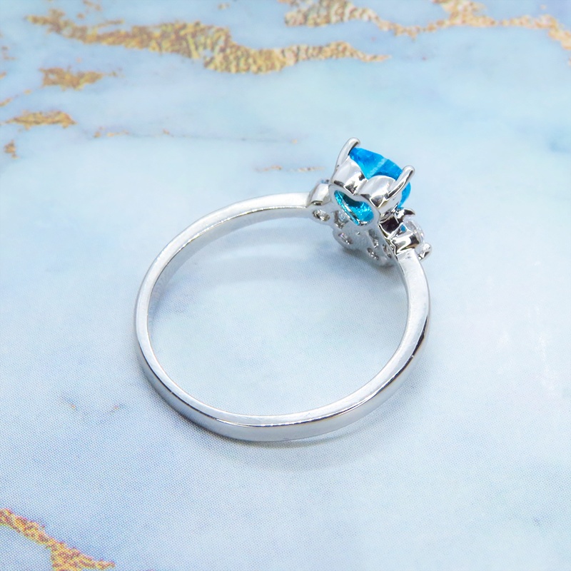 ジルコンで散りばめられた肉球モチーフの大人可愛いリング SV925プレーテッド ブルージルコン サイズ13号 猫 犬