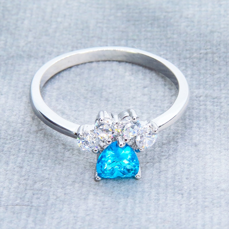 ジルコンで散りばめられた肉球モチーフの大人可愛いリング SV925プレーテッド ブルージルコン サイズ13号 猫 犬