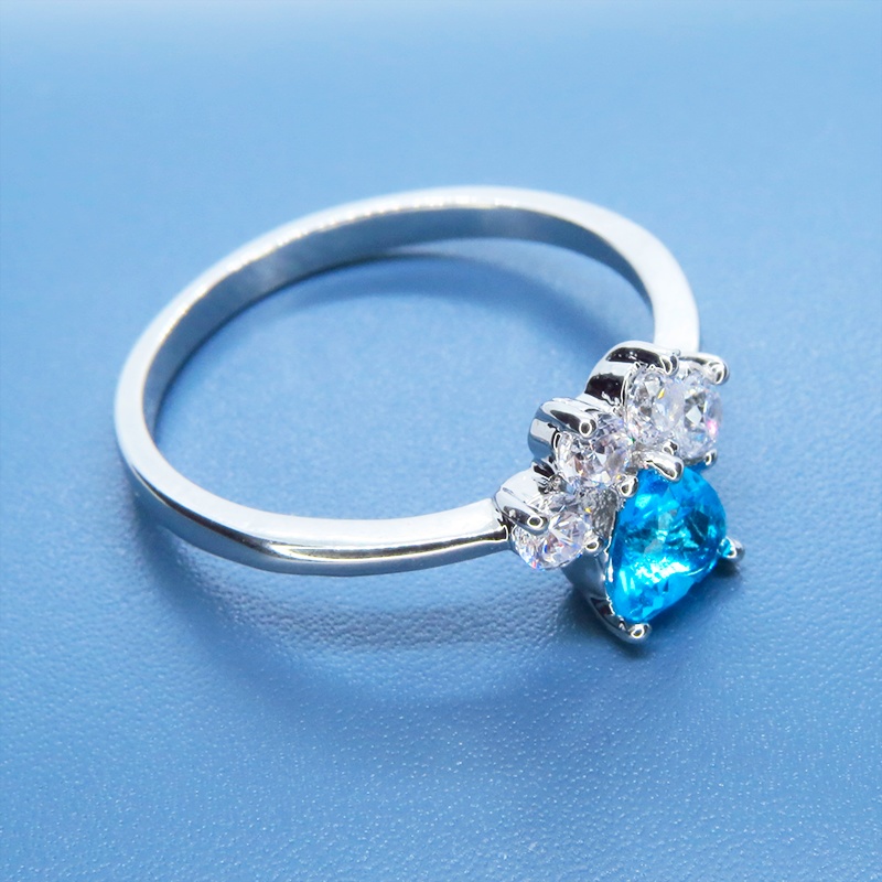 ジルコンで散りばめられた肉球モチーフの大人可愛いリング SV925プレーテッド ブルージルコン サイズ13号 猫 犬