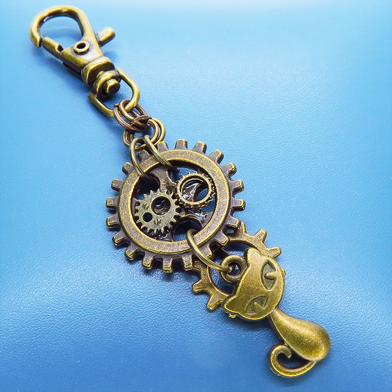 アンティークゴールド 猫と歯車を組合せたスチームパンク風キーホルダー バッグチャーム ファスナーチャーム