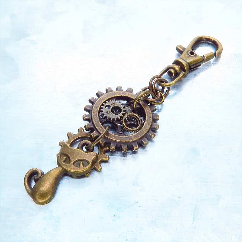 アンティークゴールド 猫と歯車を組合せたスチームパンク風キーホルダー バッグチャーム ファスナーチャーム