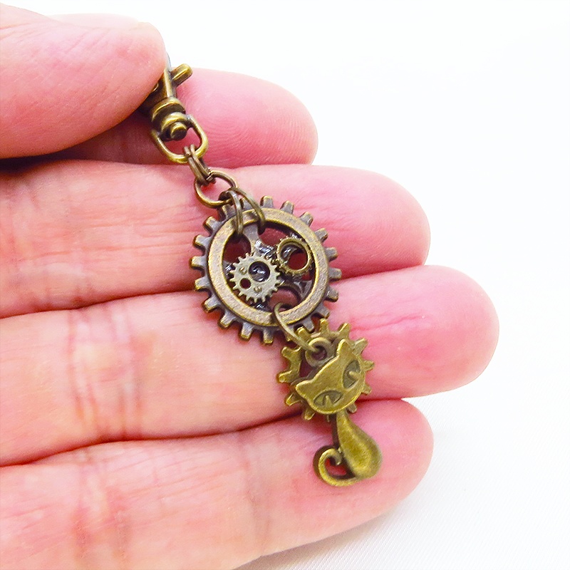 アンティークゴールド 猫と歯車を組合せたスチームパンク風キーホルダー バッグチャーム ファスナーチャーム