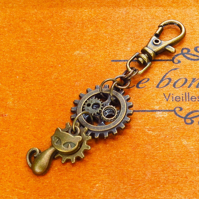 アンティークゴールド 猫と歯車を組合せたスチームパンク風キーホルダー バッグチャーム ファスナーチャーム