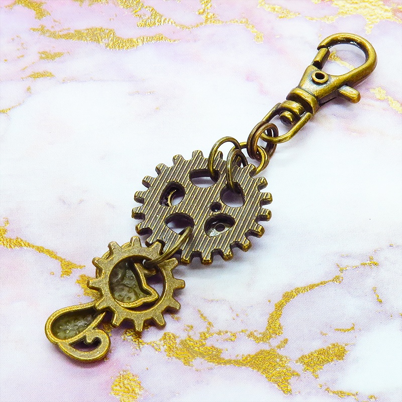 アンティークゴールド 猫と歯車を組合せたスチームパンク風キーホルダー バッグチャーム ファスナーチャーム