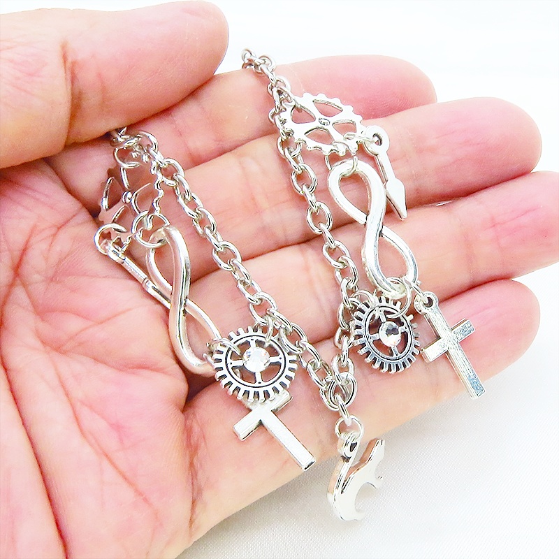 アンティークシルバー 跳ね猫と歯車を組合せたスチームパンク風ブレスレット ラインストーン