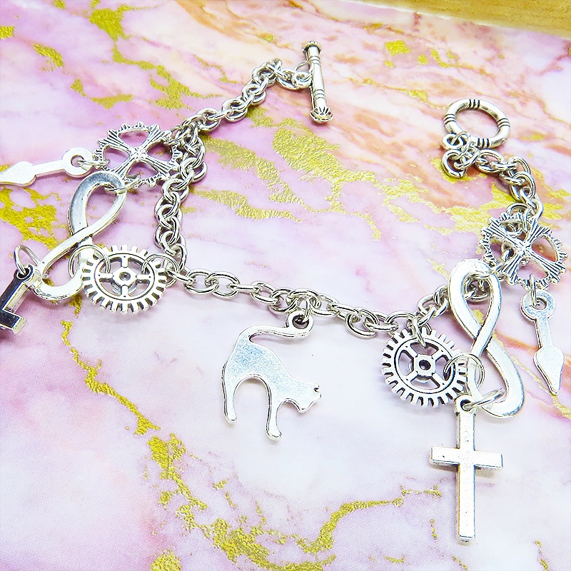 アンティークシルバー 跳ね猫と歯車を組合せたスチームパンク風ブレスレット ラインストーン