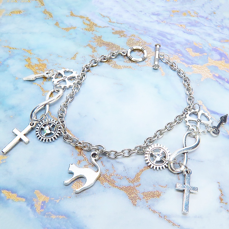 アンティークシルバー 跳ね猫と歯車を組合せたスチームパンク風ブレスレット ラインストーン