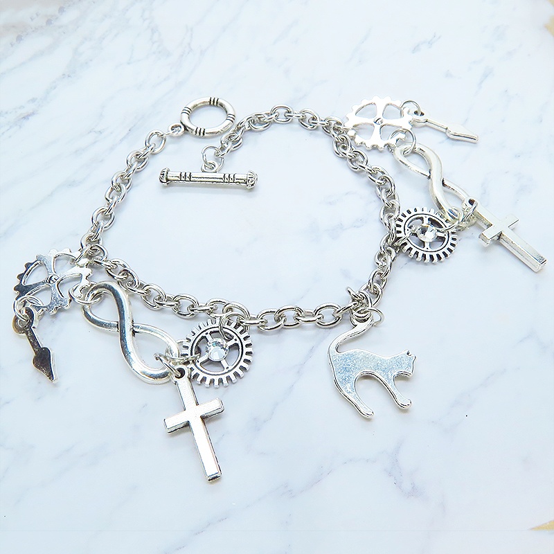 アンティークシルバー 跳ね猫と歯車を組合せたスチームパンク風ブレスレット ラインストーン