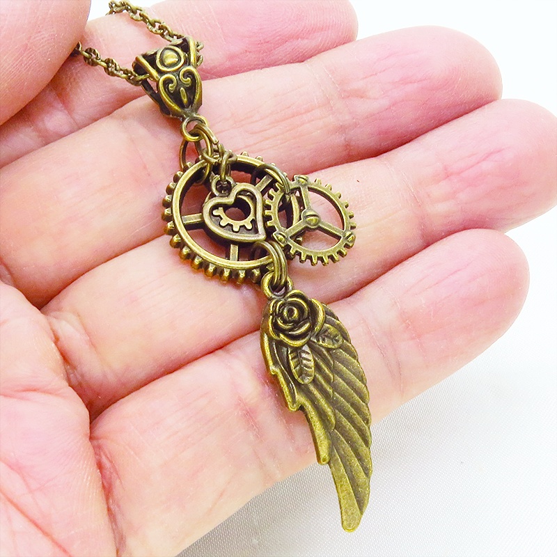 アンティークゴールド 翼と歯車を組合せたスチームパンク風ネックレス オープンハート 長さ調整可 アジャスター追加可