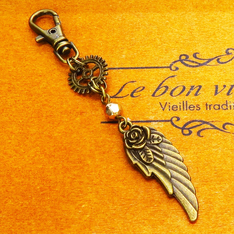 アンティークゴールド 翼と歯車を組合せたスチームパンク風チャーム キーホルダー バッグチャーム