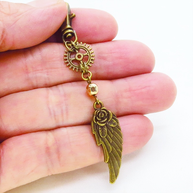 アンティークゴールド 翼と歯車を組合せたスチームパンク風チャーム キーホルダー バッグチャーム