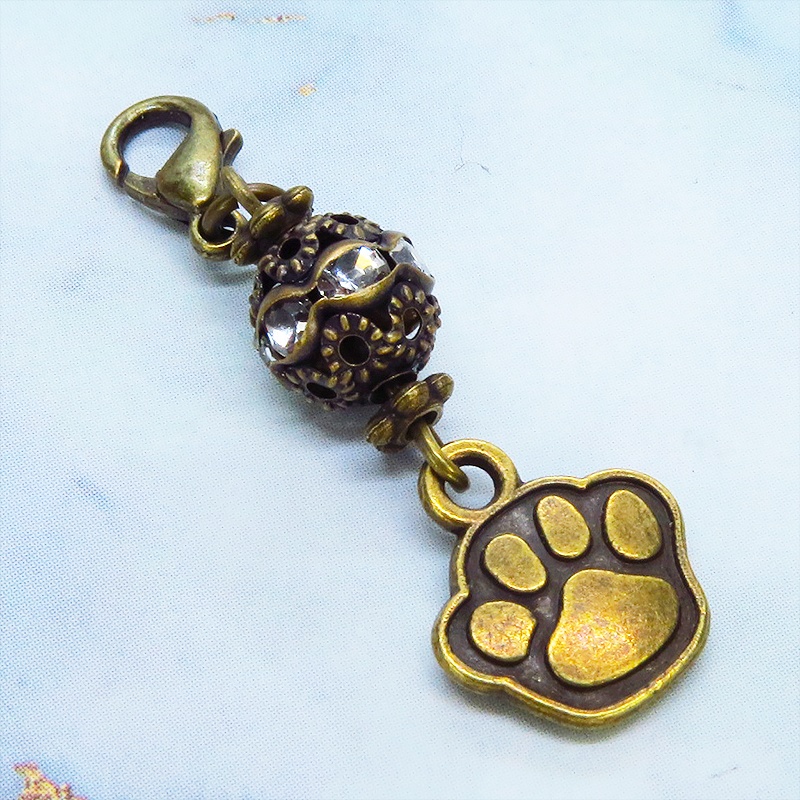 スマホ・マスクチャーム アンティークゴールド 肉球とメタルビーズのチャーム 猫 犬 金具変更可 ジャックピン追加可能