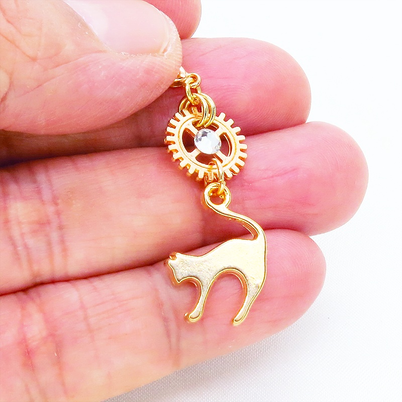 マスク・スマホチャーム マットゴールド 跳ね猫と歯車を組合せたチャーム ジャックピン追加可