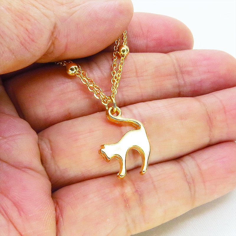 マットゴールド 跳ね猫モチーフのダブルチェーンブレスレット ビーズ付チェーン アジャスター可