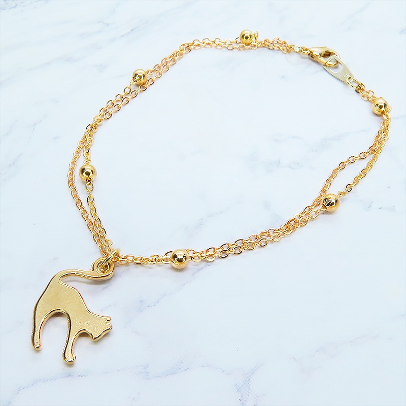 マットゴールド 跳ね猫モチーフのダブルチェーンブレスレット ビーズ付チェーン アジャスター可