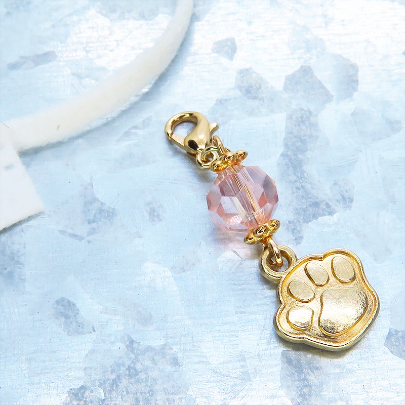 マスク・スマホチャーム マットゴールド 肉球モチーフとクリスタルガラスのチャーム 金具変更・ジャックピン追加可