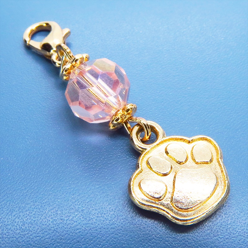 マスク・スマホチャーム マットゴールド 肉球モチーフとクリスタルガラスのチャーム 金具変更・ジャックピン追加可