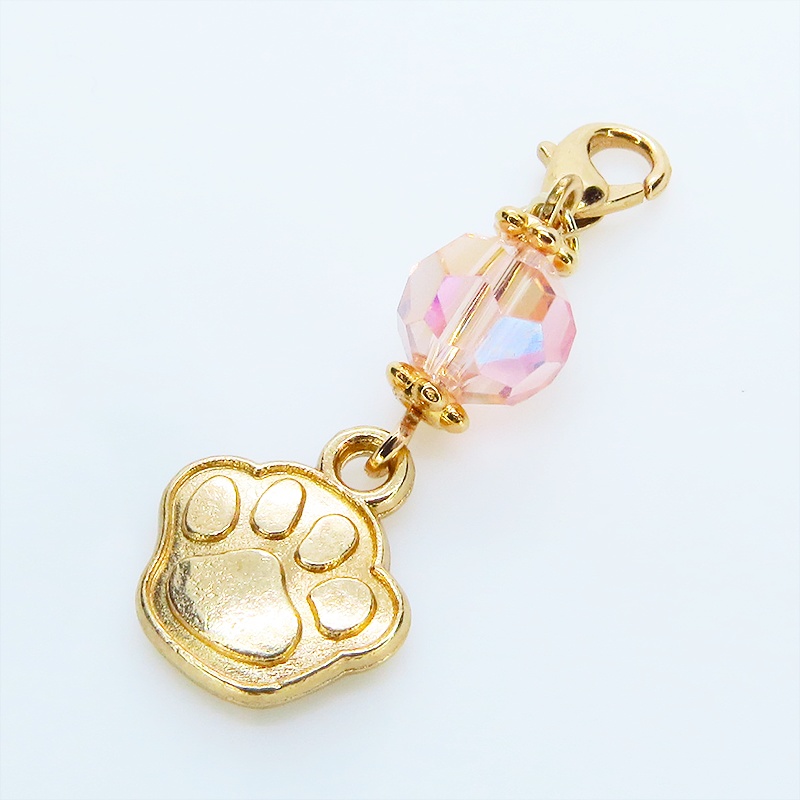 マスク・スマホチャーム マットゴールド 肉球モチーフとクリスタルガラスのチャーム 金具変更・ジャックピン追加可