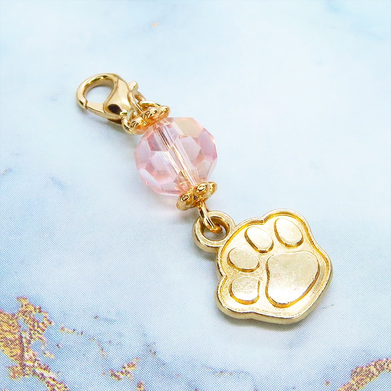 マスク・スマホチャーム マットゴールド 肉球モチーフとクリスタルガラスのチャーム 金具変更・ジャックピン追加可