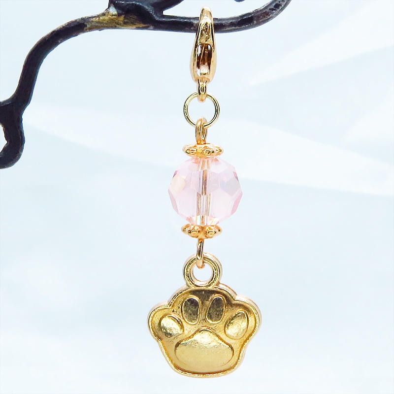 マスク・スマホチャーム マットゴールド 肉球モチーフとクリスタルガラスのチャーム 金具変更・ジャックピン追加可