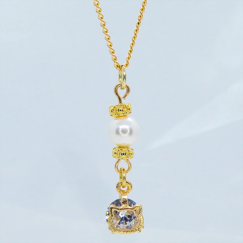 マットゴールド キュービックジルコニアの猫フェイスフレームとスワロフスキーパールのネックレス 長さ変更可 アジャスター可