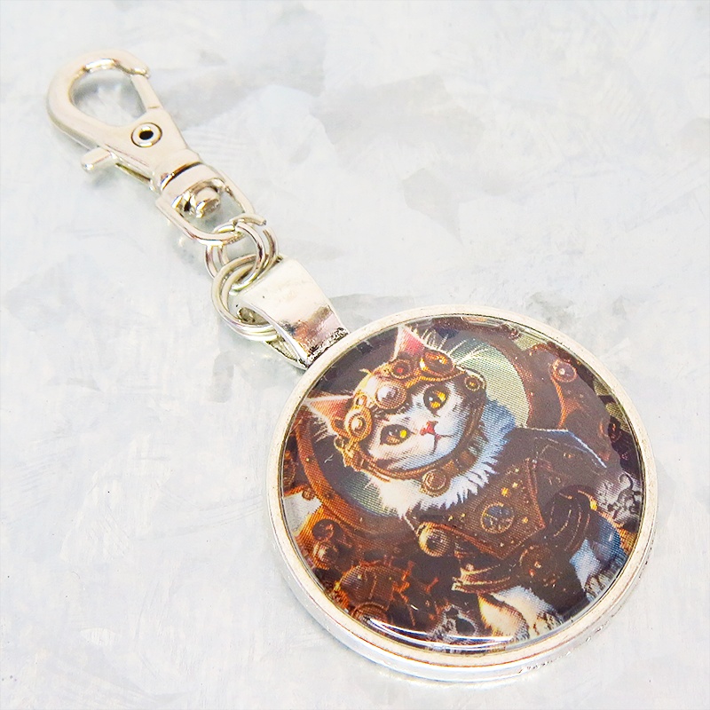 猫とスチームパンクなカボションガラスキーホルダー 零型アンティークシルバー仕様 金具変更可 バッグチャーム