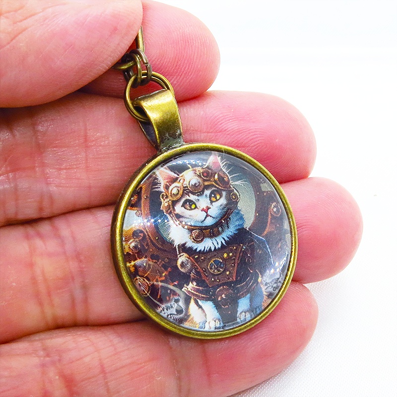 猫とスチームパンクなカボションガラスキーホルダー 零型アンティークゴールド仕様 金具変更可 バッグチャーム