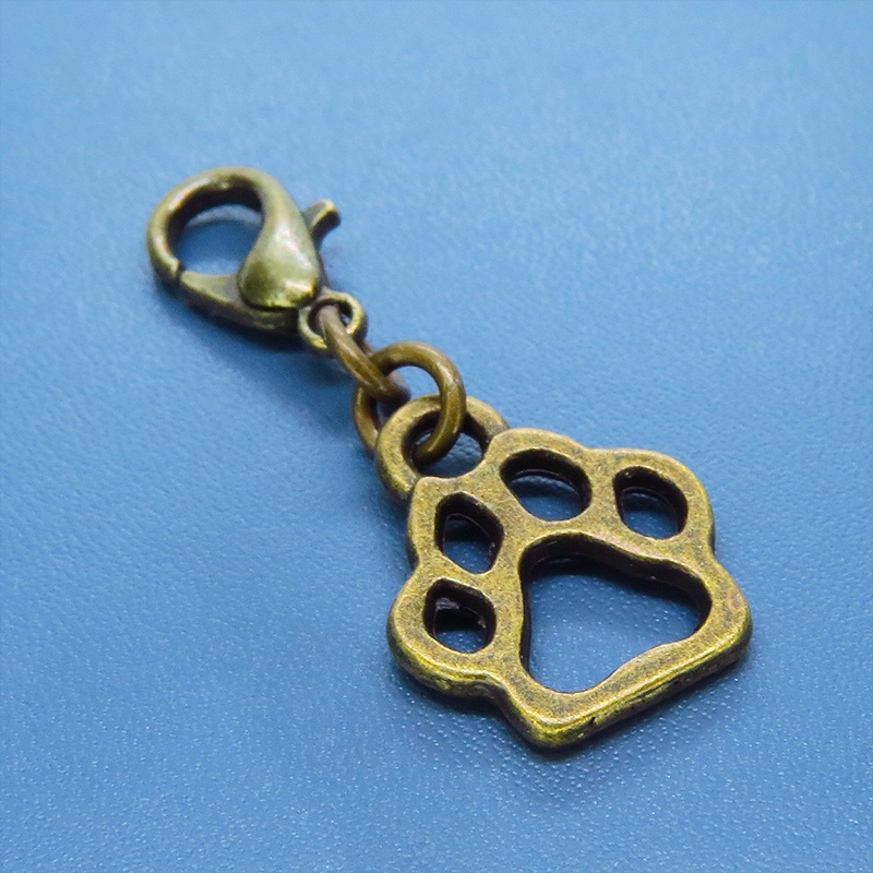 マスク・スマホチャーム アンティークゴールド ダイカット肉球モチーフのシンプルなチャーム 金具変更可 ジャックピン追加可