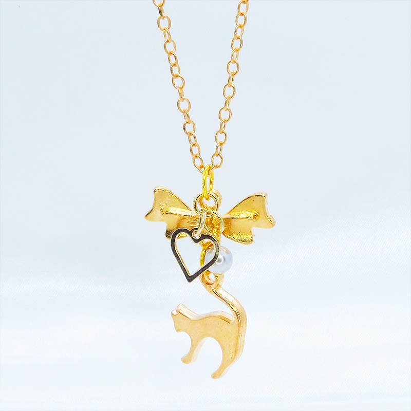 マットゴールド 跳ね猫とリボンのコンパクトなネックレス ガラスパール(シルバーグレー) 長さ調整可