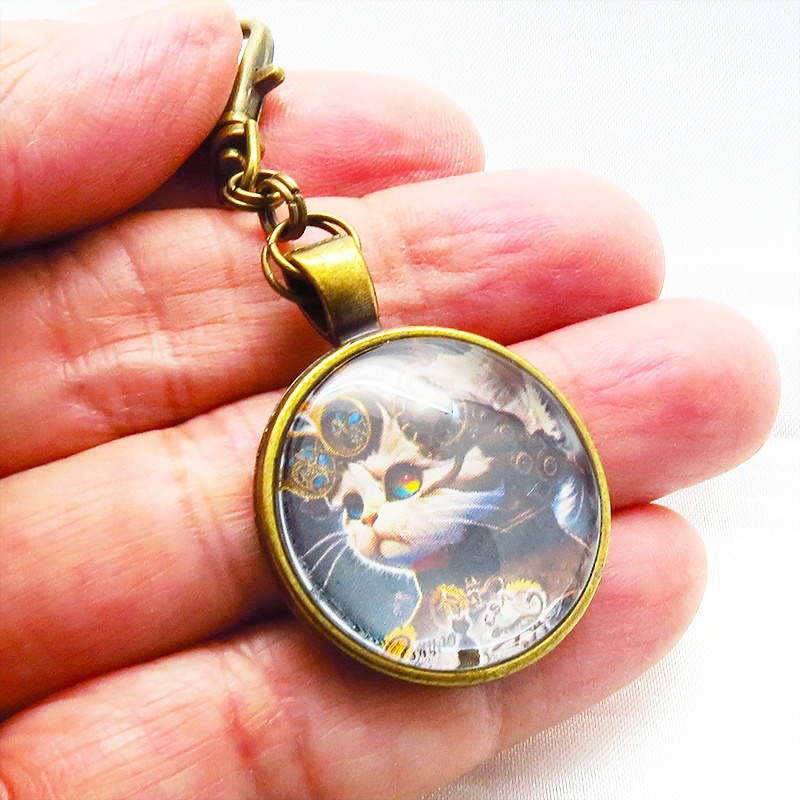 猫とスチームパンクなカボションガラスキーホルダー 壱型アンティークゴールド仕様 金具変更可 バッグチャーム