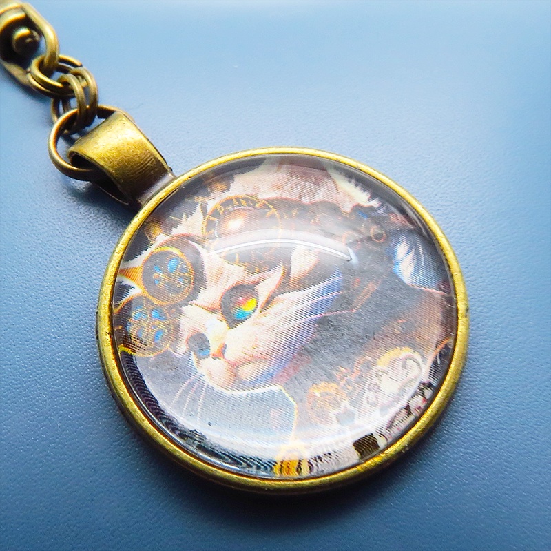 猫とスチームパンクなカボションガラスキーホルダー 壱型アンティークゴールド仕様 金具変更可 バッグチャーム