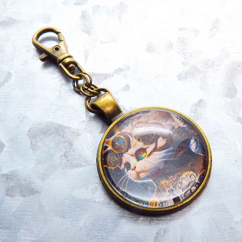 猫とスチームパンクなカボションガラスキーホルダー 壱型アンティークゴールド仕様 金具変更可 バッグチャーム