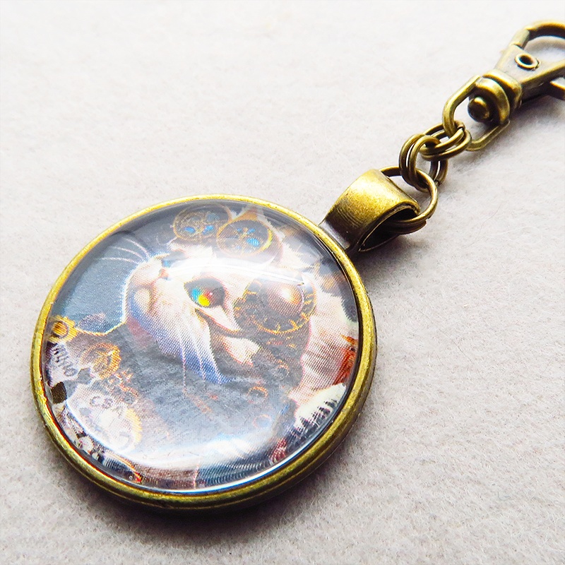 猫とスチームパンクなカボションガラスキーホルダー 壱型アンティークゴールド仕様 金具変更可 バッグチャーム