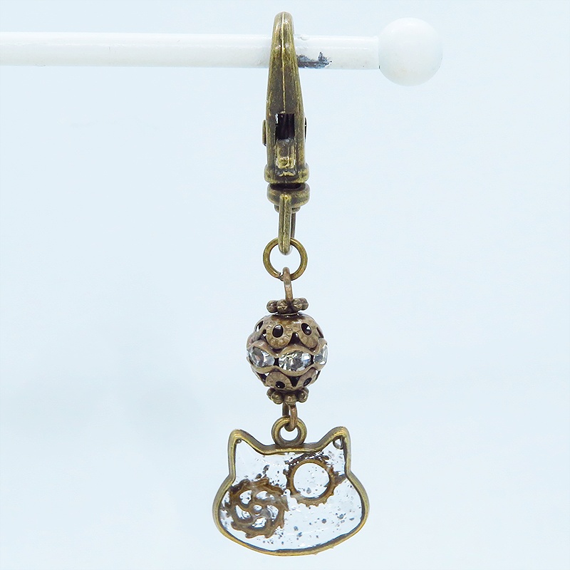 アンティークゴールド 猫フェイスに歯車を封入した可愛いキーホルダー レジン スチームパンク風 金具変更可