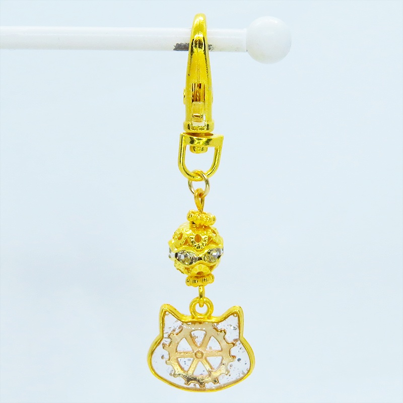 ゴールドカラー 猫フェイスに歯車を封入した可愛いキーホルダー レジン スチームパンク風 金具変更可