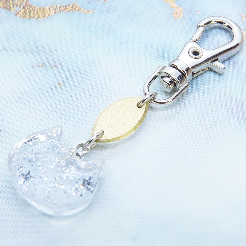 クリアな猫フェイスチャームとスワロフスキーのキーホルダー シルバーカラー バッグチャーム 金具変更可